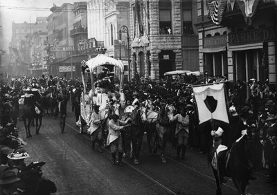 Mardi Gras day, Rex passing up Camp Street, New Orleans, c.1900-06 by Detroit Publishing Co.